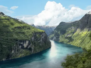 View of a river surrounded by mountains