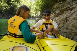 Couple rides with kayak
