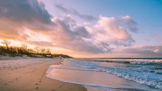 Baltic Sea at sunset with waves